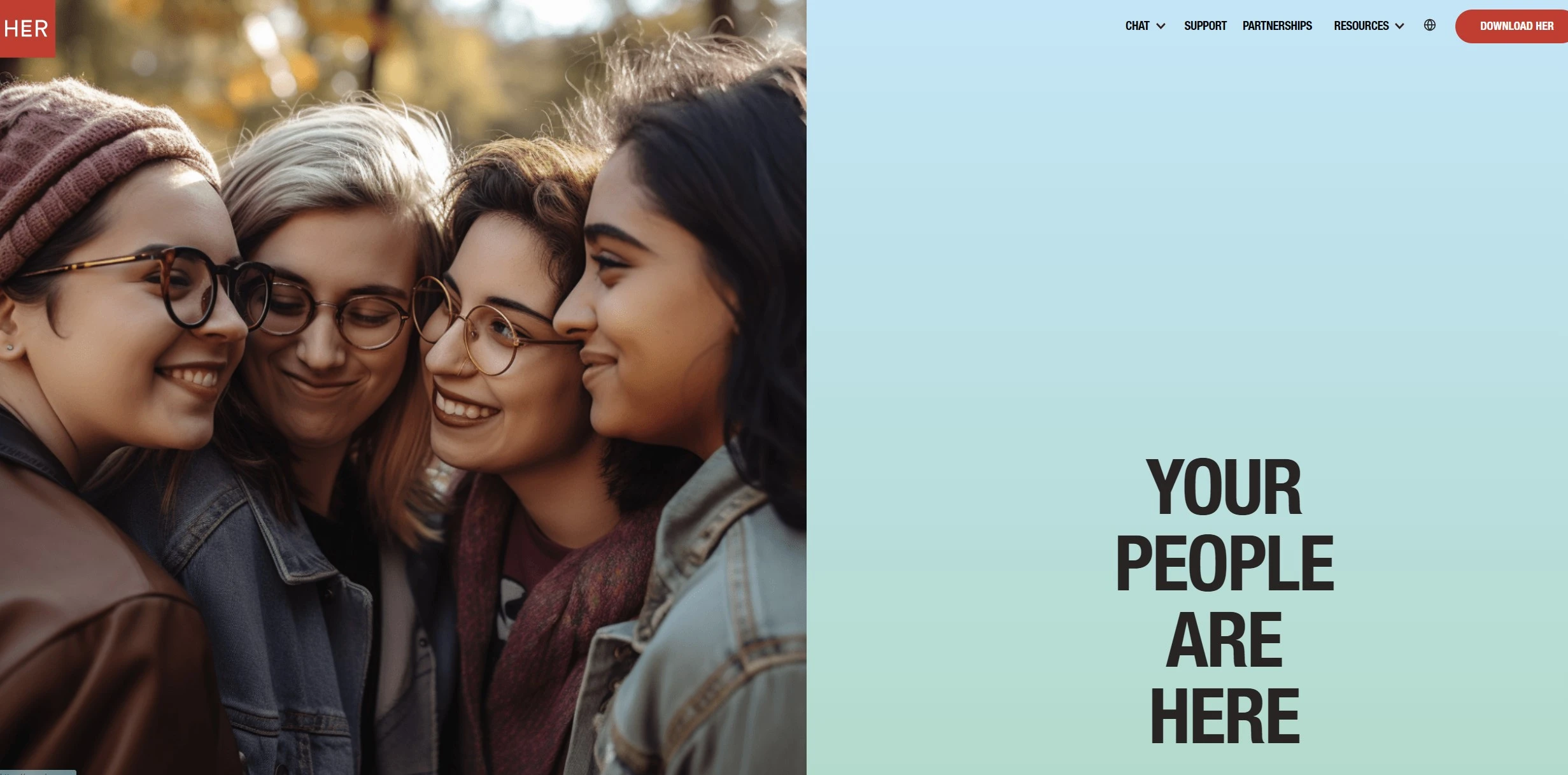 HER lesbian dating app homepage of two women kissing.